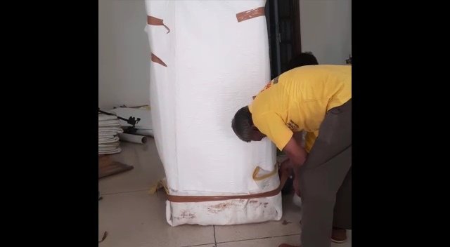 Prince Packers Movers team in yellow uniform doing office shifting in Delhi